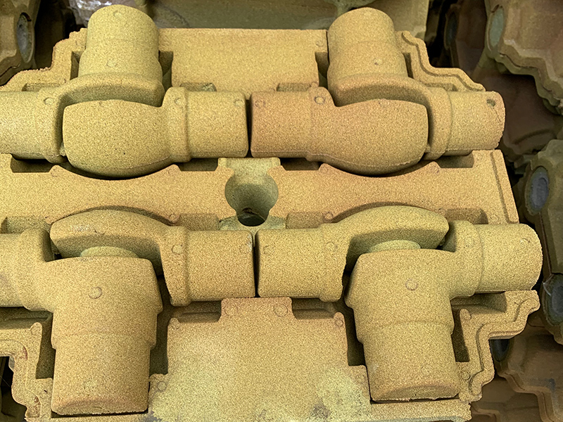 Nola konpondu hondarra itsatsitako akatsen akatsen akatsen grisaren produkzioan, zinta estalitako harea teknologia erabiliz?